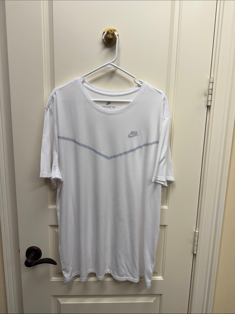 Nike White Short Sleeve Athletic Tee with Light Gray Chevron Accent